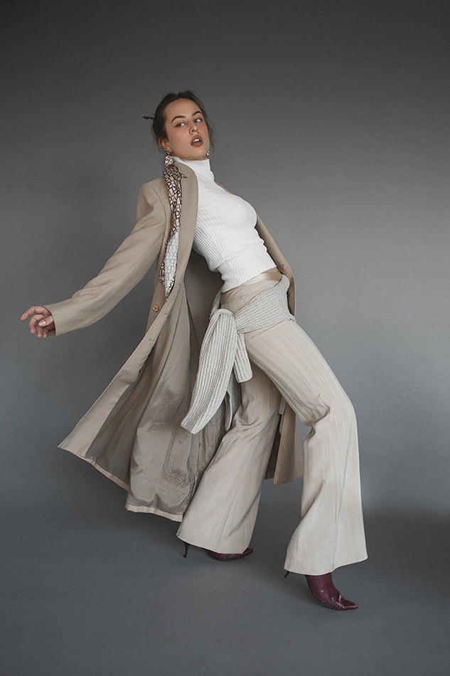 Savannah, a Brisbane and Gold Coast model from TMA, posing on the beach in a bikini during golden hour, captured by photographer Sam David.
