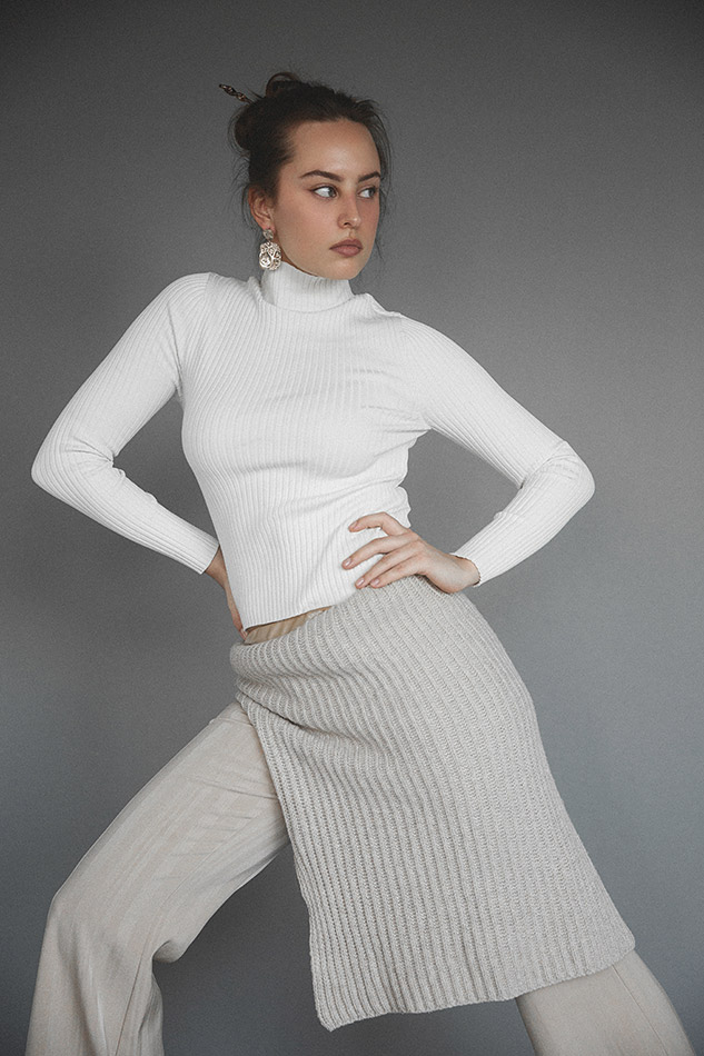 Savannah, a Brisbane and Gold Coast model from TMA, posing on the beach in a bikini during golden hour, captured by photographer Sam David.