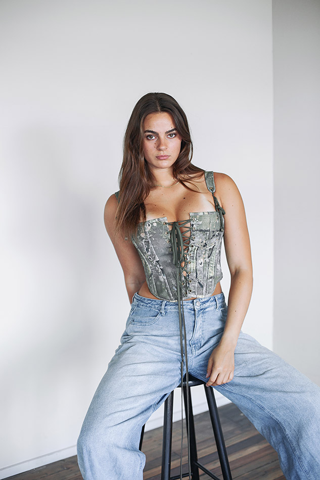 Savannah, a Brisbane and Gold Coast model from TMA, posing on the beach in a bikini during golden hour, captured by photographer Evelina Fietisova for Seamless Underwear