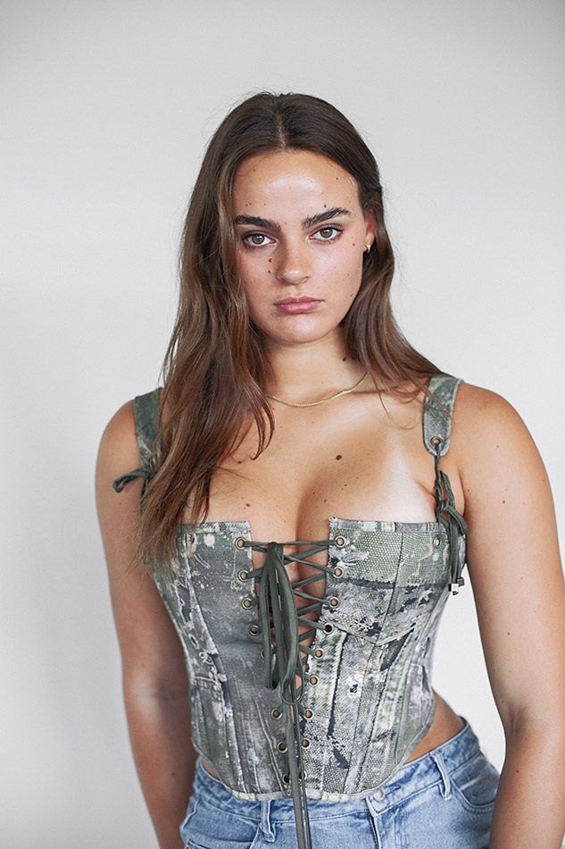 Savannah, a Brisbane and Gold Coast model from TMA, posing on the beach in a bikini during golden hour, captured by photographer Evelina Fietisova for Seamless Underwear