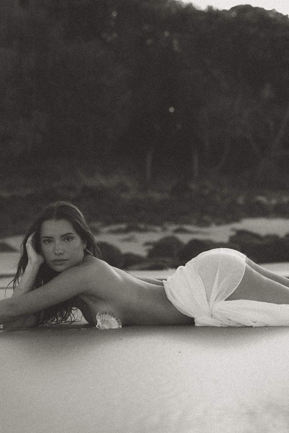 Savannah, a Brisbane and Gold Coast model from TMA, posing on the beach in a bikini during golden hour, captured by photographer Sam David.